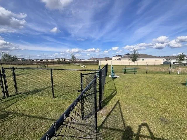 a view of a lake with a outdoor space