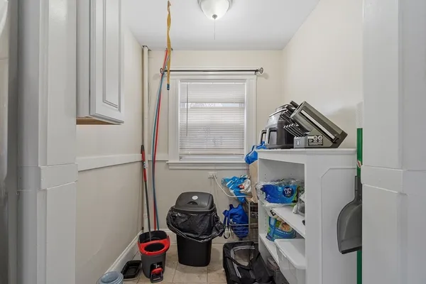 a view of storage and utility room with washer and dryer
