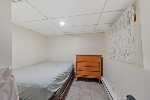 a view of room with stairs and a ceiling fan