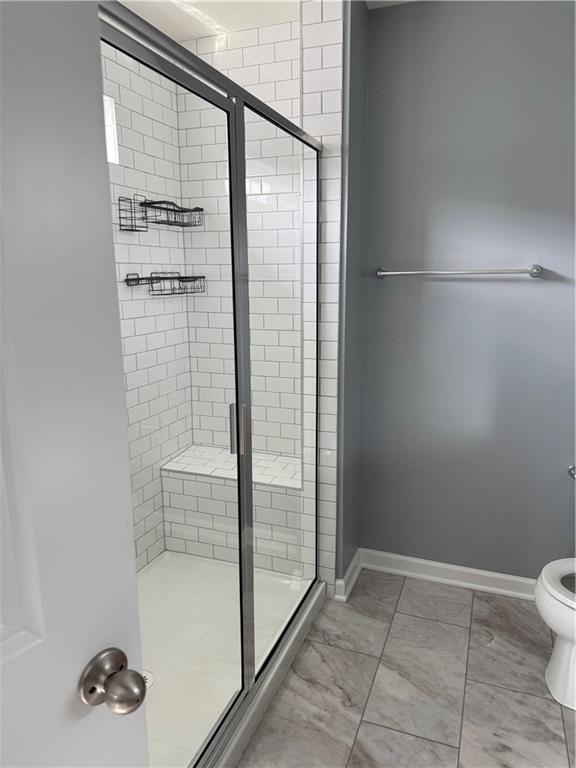 131 Affinity Drive Harmony, PA 16037 - Photo 12 of 12 a bathroom with a bathtub and shower