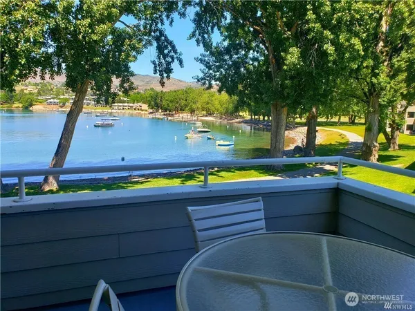 an aerial view of a house with a lake view