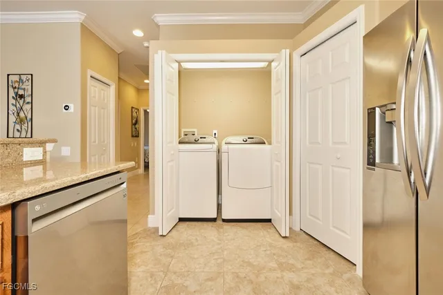 a view of a kitchen with a refrigerator