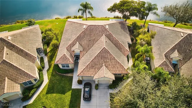 an aerial view of a house with swimming pool