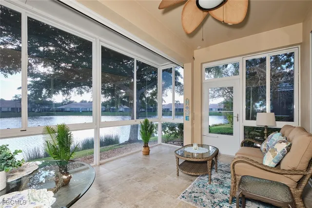 a outdoor space with patio couch and potted plants