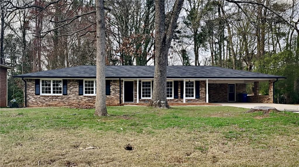 3936 Appleton Court Decatur, GA 30034 - Photo 1 of 1 front view of a brick house with a yard
