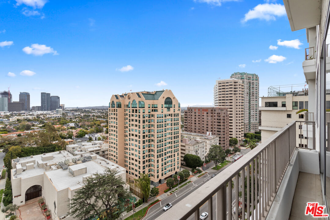 10501 Wilshire Boulevard, Unit 1605 Los Angeles, CA 90024 - Photo 12 of 27 a view of a city skyline from a balcony