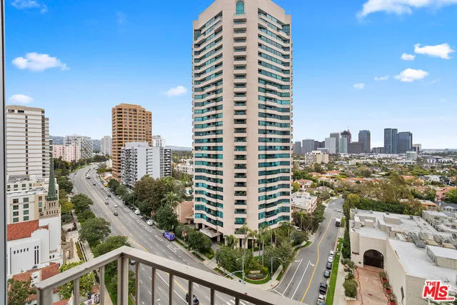 a view of a city with tall buildings