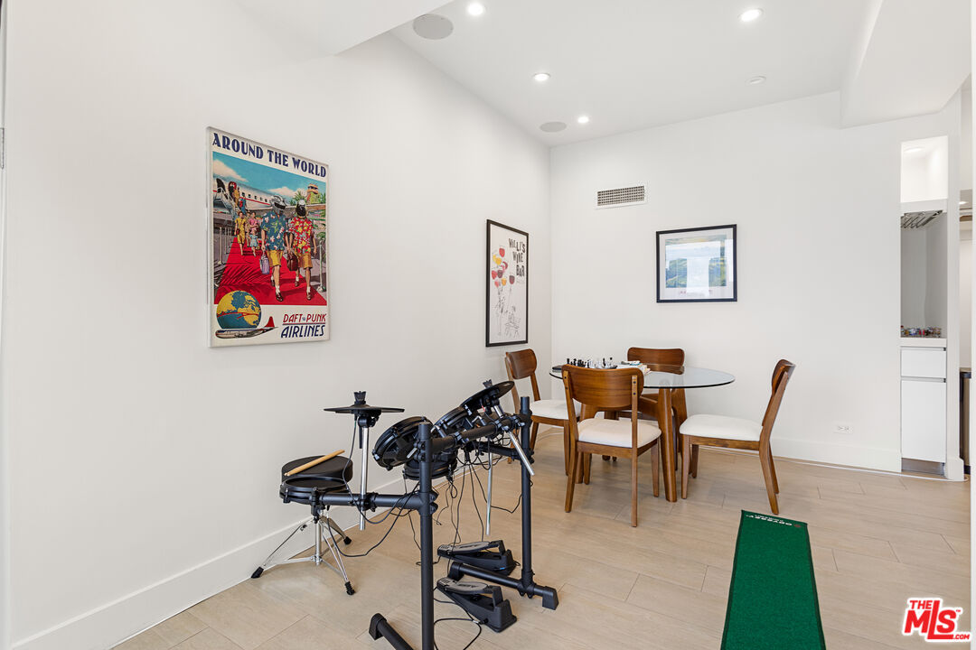 10501 Wilshire Boulevard, Unit 1605 Los Angeles, CA 90024 - Photo 16 of 27 a view of a livingroom with furniture and a work space