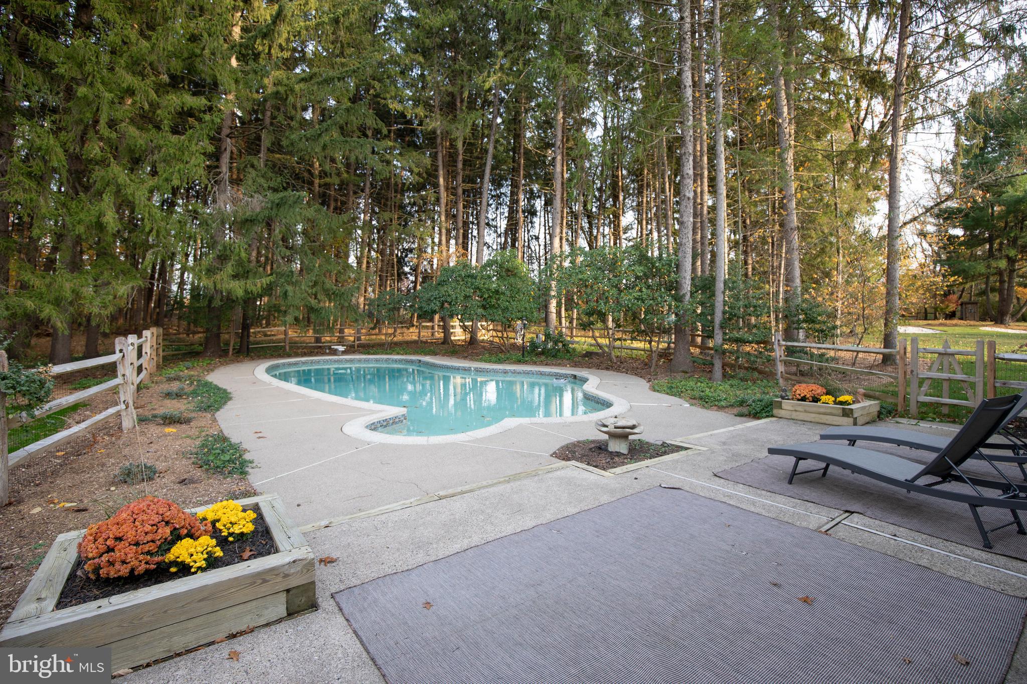 153 Ash Way Doylestown, PA 18901 - Photo 2 of 7 a view of a backyard with a patio