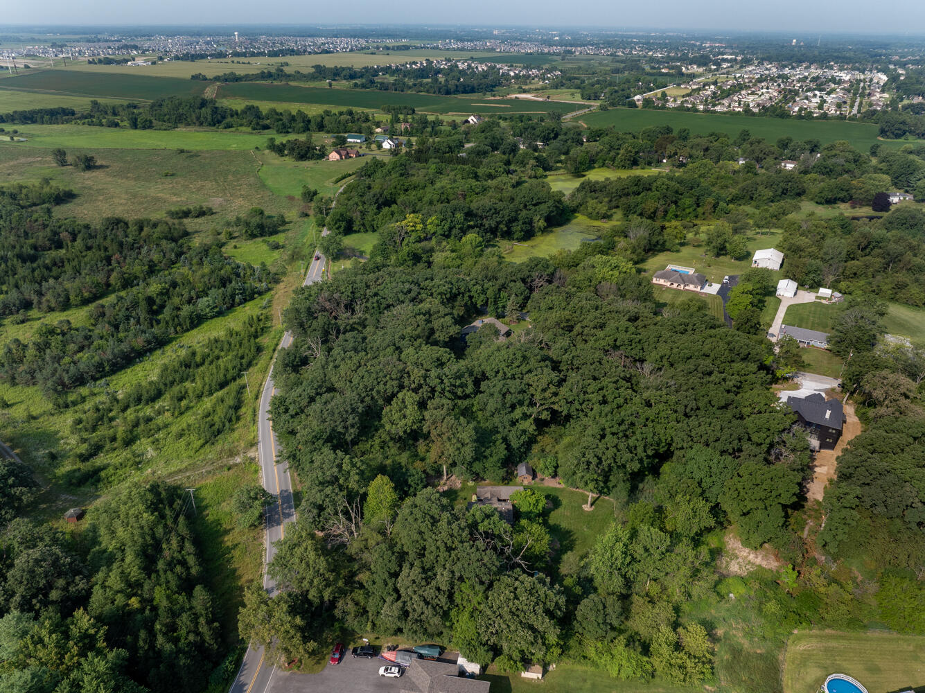 6308 West 91st Avenue Crown Point, IN 46307 - Photo 14 of 16 an aerial view of a city with lots of residential buildings
