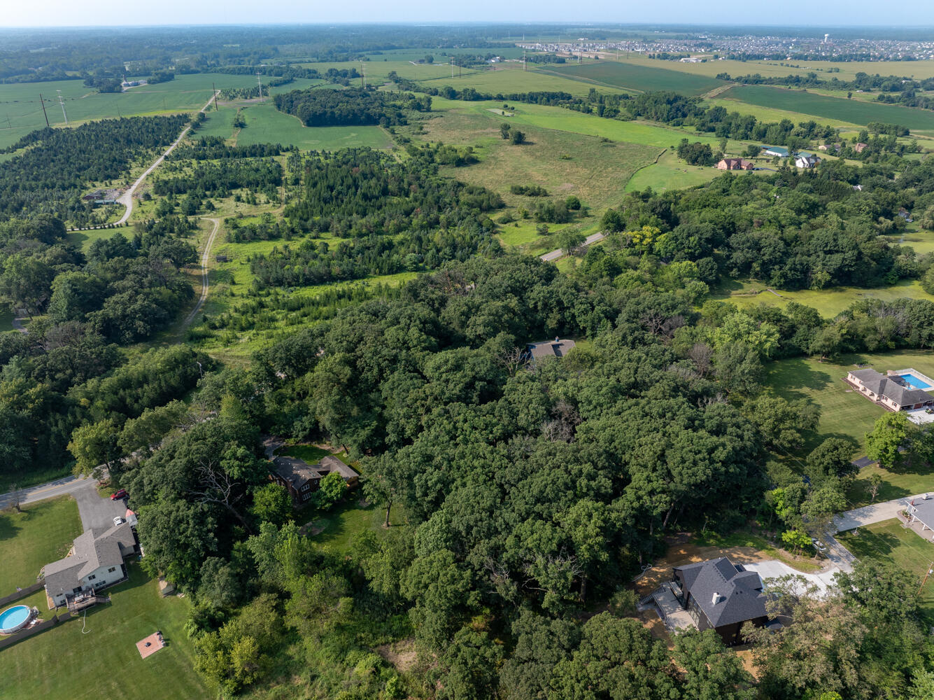 6308 West 91st Avenue Crown Point, IN 46307 - Photo 16 of 16 an aerial view of a houses with outdoor space and trees