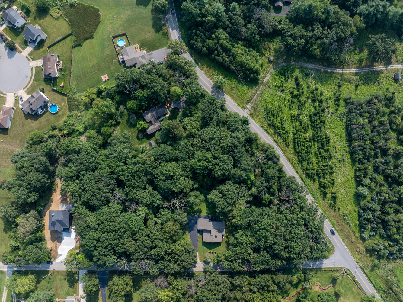 6308 West 91st Avenue Crown Point, IN 46307 - Photo 8 of 16 an aerial view of a house with a yard