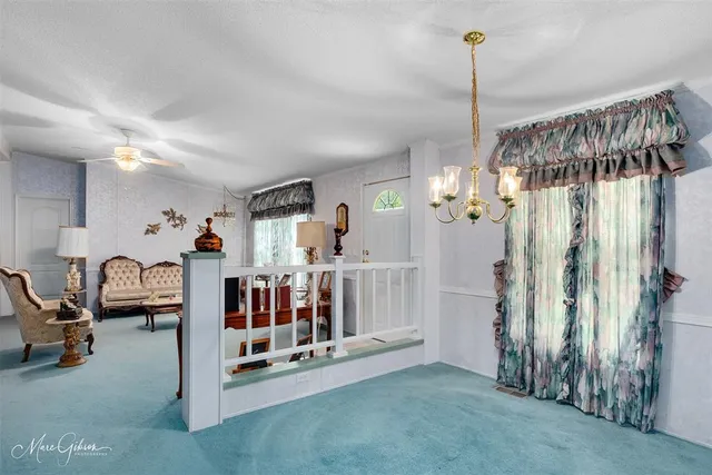 a view of a bedroom with gym equipment