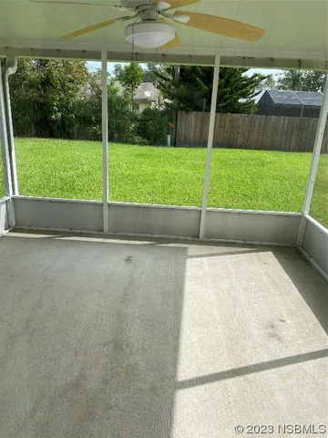 an empty room with sliding door