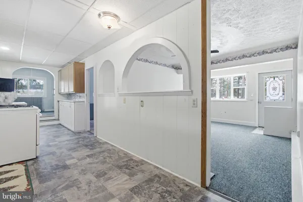 a view of a kitchen with a sink