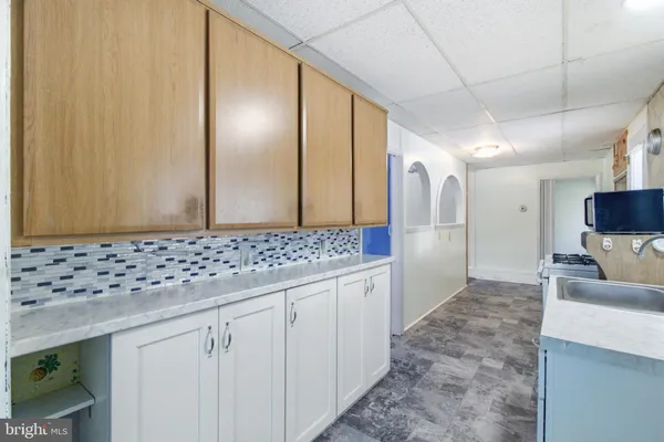 a view of a refrigerator and window