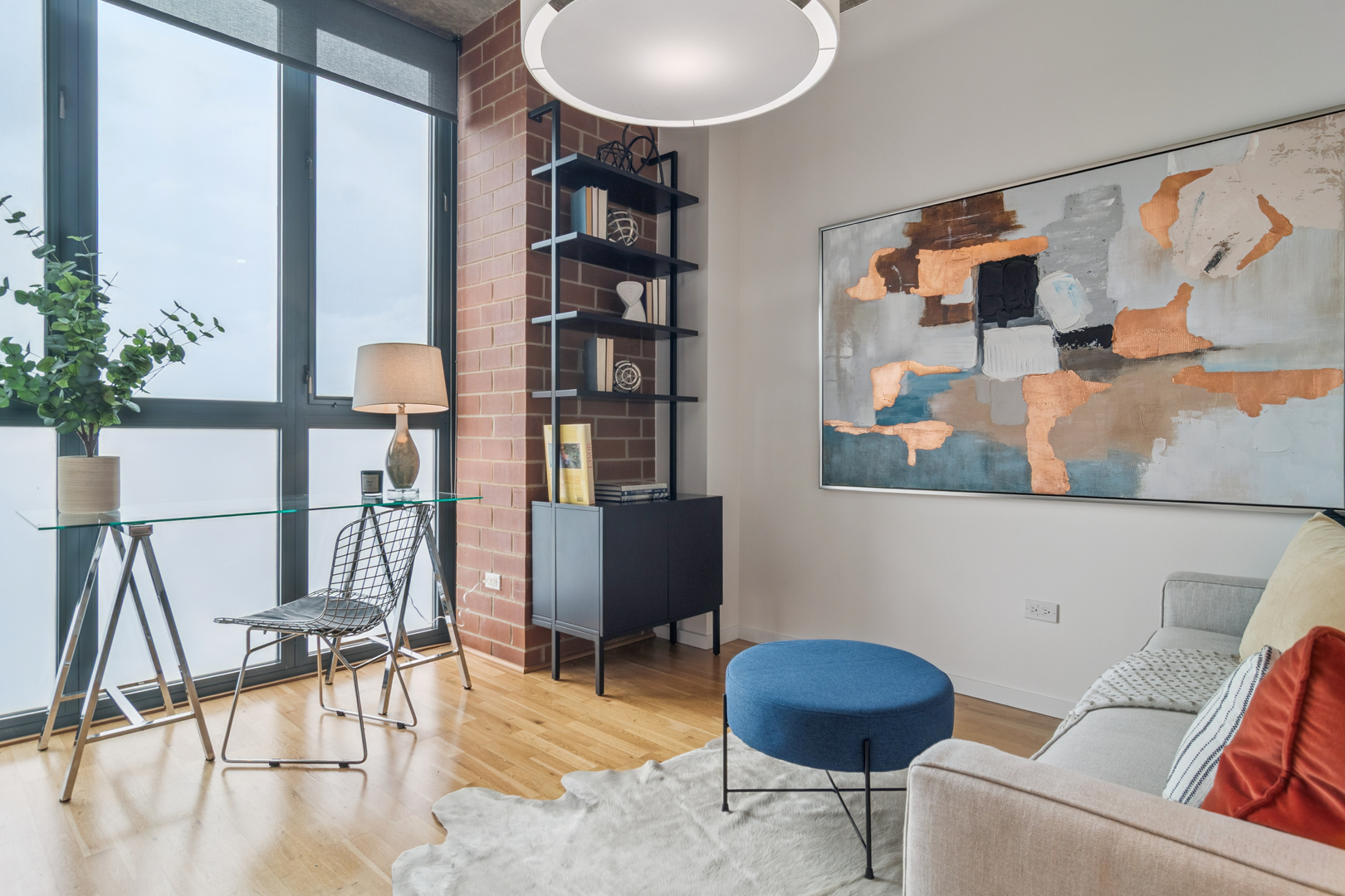 321 South Sangamon Street, Unit 501 Chicago, IL 60607 - Photo 6 of 11 a living room with furniture and a potted plant