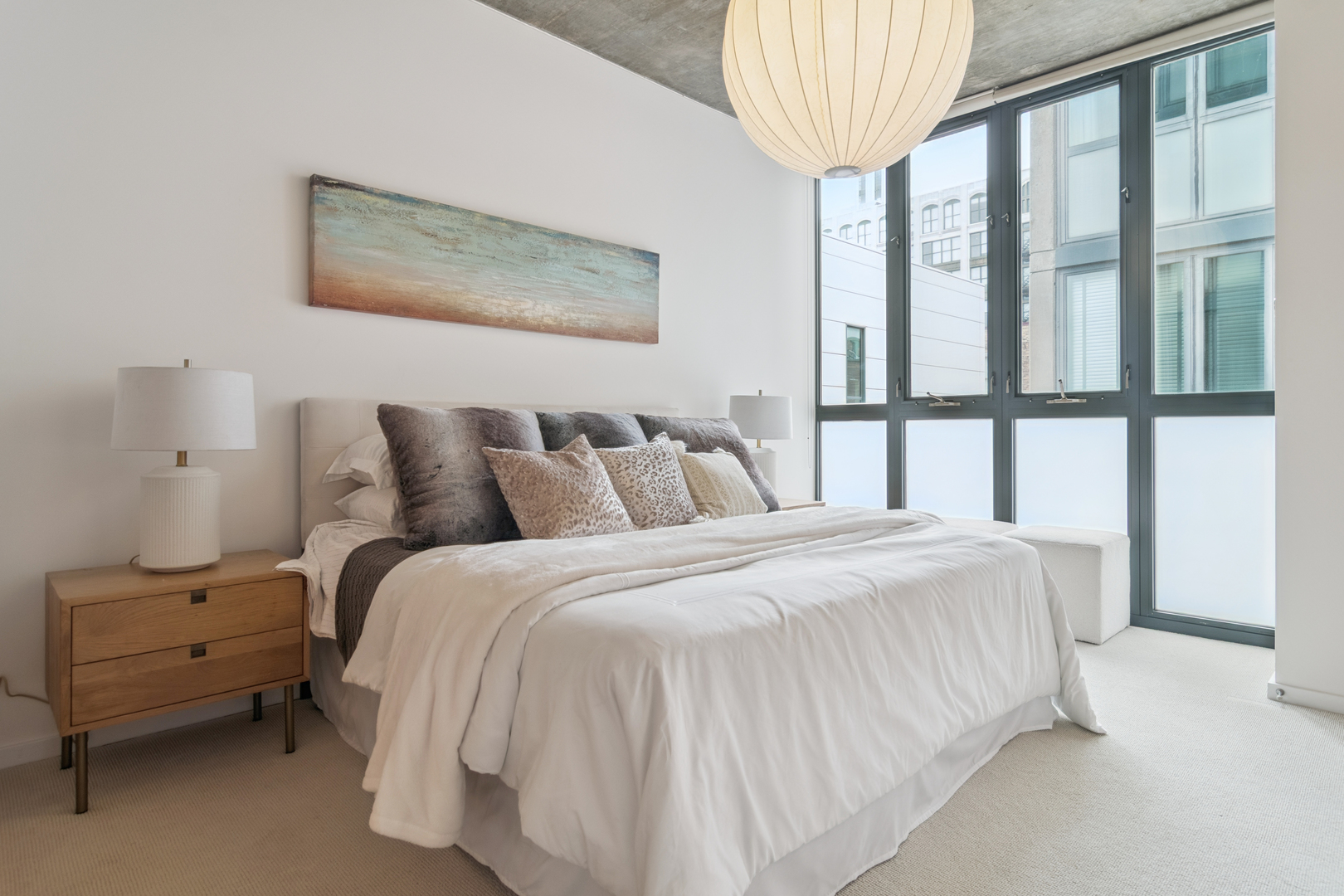 321 South Sangamon Street, Unit 501 Chicago, IL 60607 - Photo 7 of 11 a bedroom with bed and a window