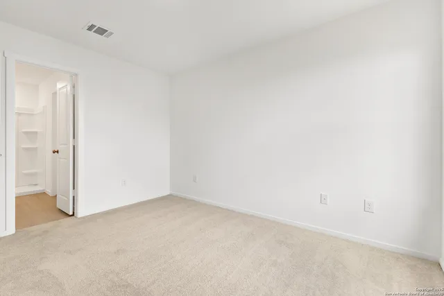 an empty room with an entryway