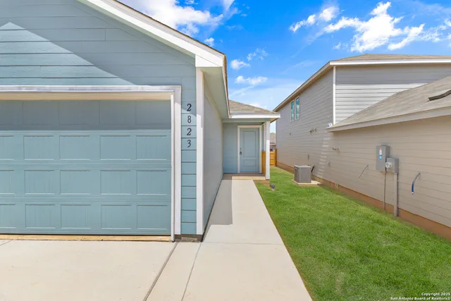 a view of a back yard of the house