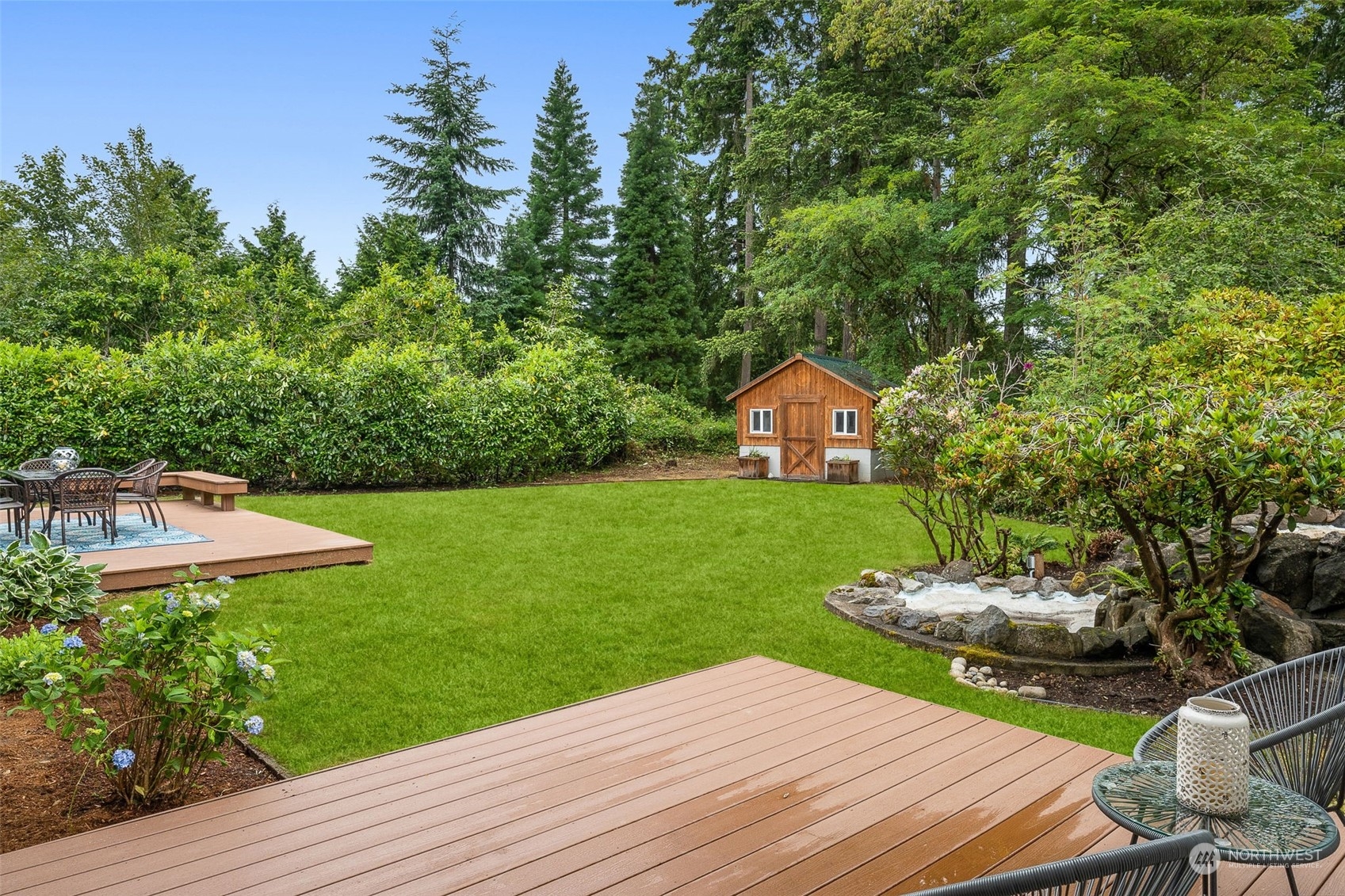 829 Harvest Road Bothell, WA 98012 - Photo 23 of 34 a front view of a house with garden