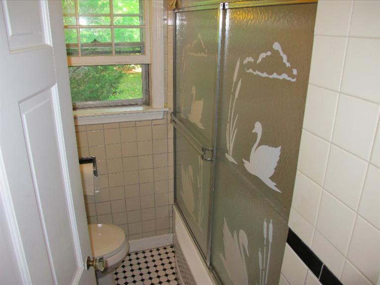 12 Iyanough Road Hyannis, MA 02601 - Photo 11 of 35 a bathroom with a window