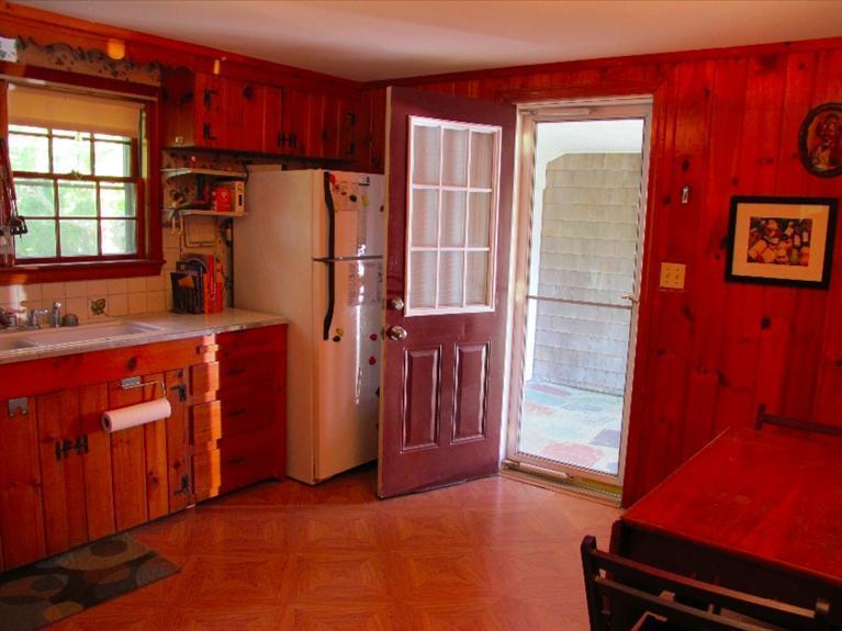 12 Iyanough Road Hyannis, MA 02601 - Photo 3 of 35 a kitchen with stainless steel appliances a refrigerator and a stove