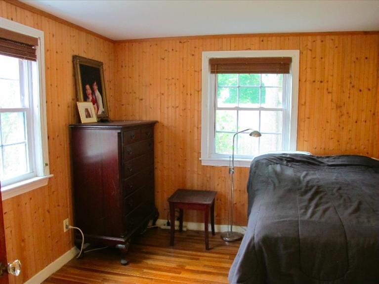 12 Iyanough Road Hyannis, MA 02601 - Photo 10 of 35 a bedroom with a bed and a window