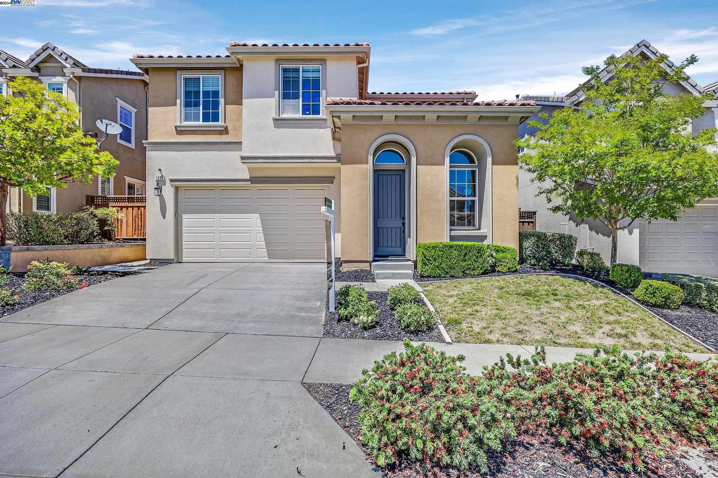 1999 Haggerty Drive Dublin, CA 94568 - Photo 1 of 1 a front view of a house with garden