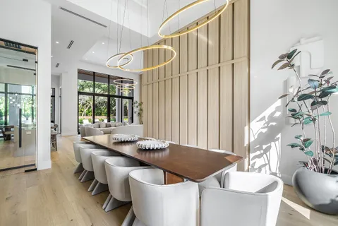 a kitchen with a sink a stove and a refrigerator