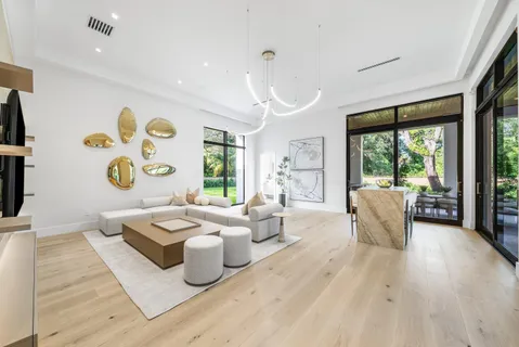 a view of a brick house with a yard