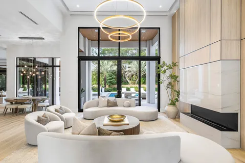 a view of a dining room with furniture and window