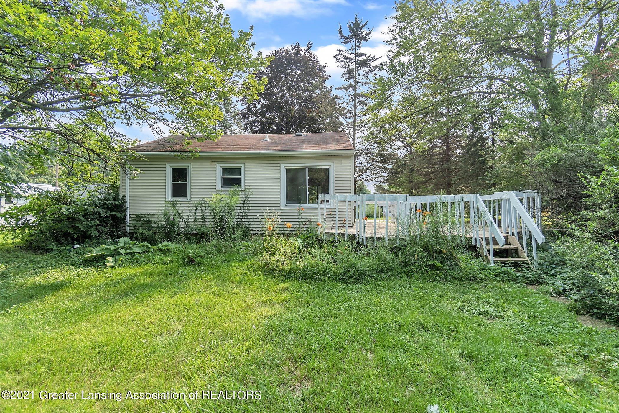 6532 Sommerset Road Lansing, MI 48911 - Photo 33 of 37 33-6532-Sommerset-Rd-WindowStill-Real-Es