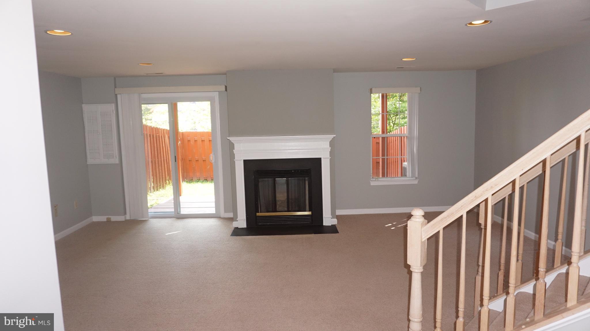 5715 Clapham Road Alexandria, VA 22315 - Photo 30 of 44 Basement Gas FPL Walkout to deck and fenced yard