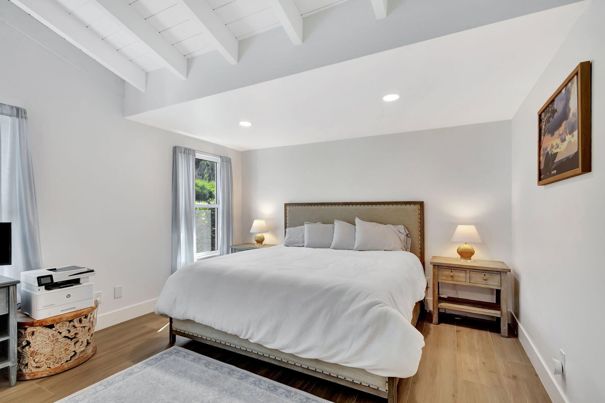 240 Celestial Way, Unit 5 Juno Beach, FL 33408 - Photo 11 of 41 a bedroom with a bed and a window