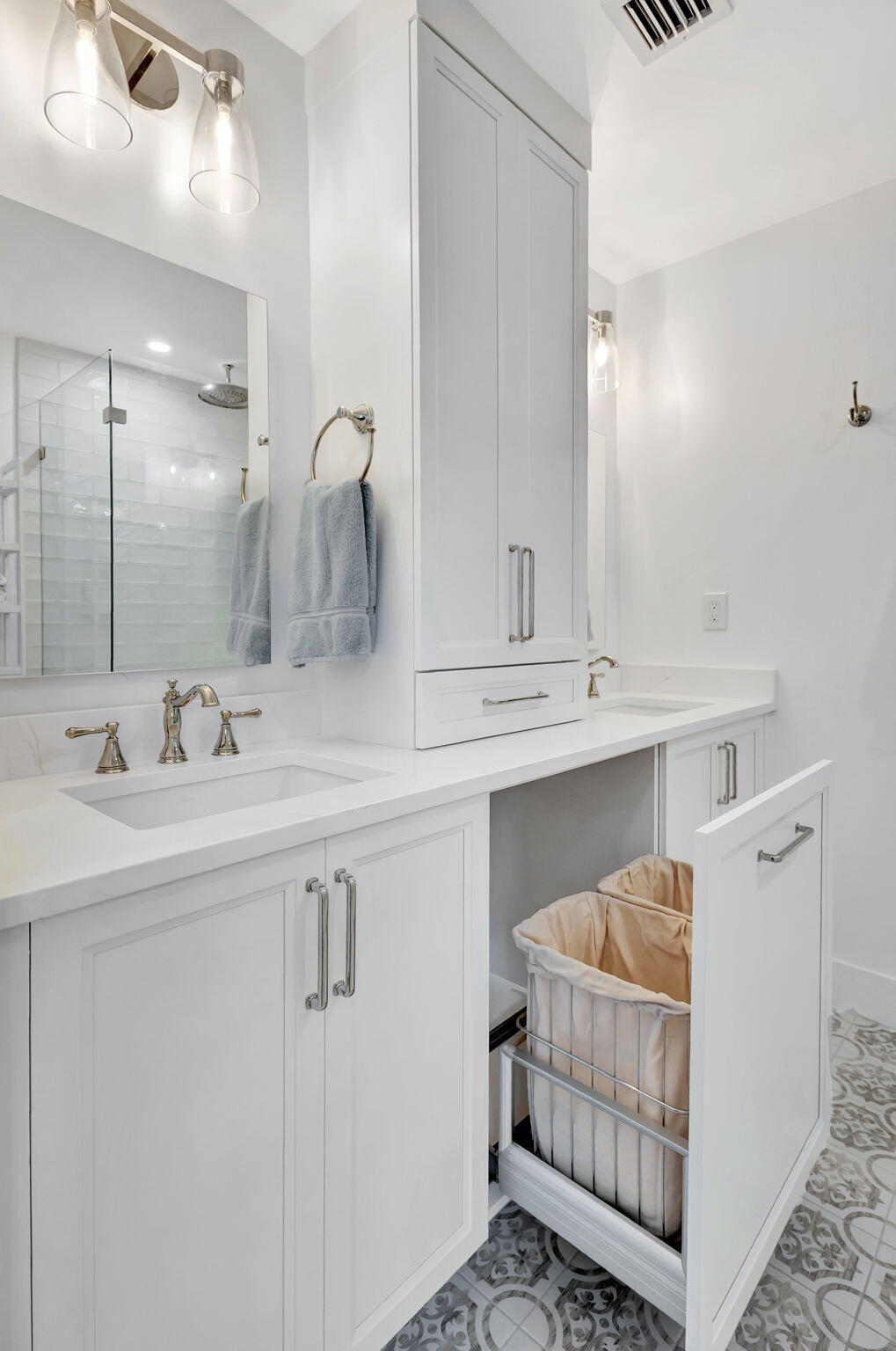 240 Celestial Way, Unit 5 Juno Beach, FL 33408 - Photo 14 of 41 a bathroom with a sink and a mirror
