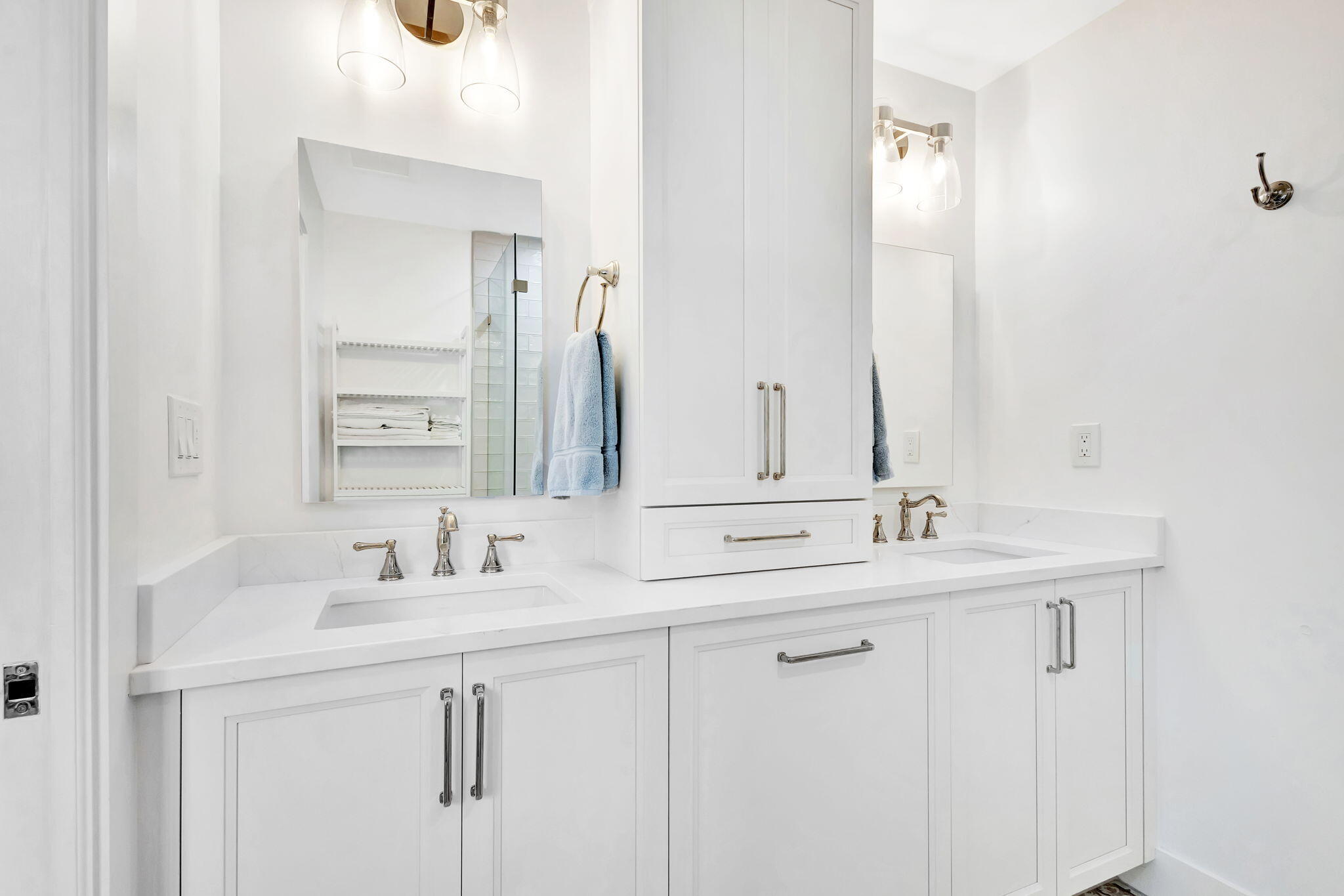 240 Celestial Way, Unit 5 Juno Beach, FL 33408 - Photo 15 of 41 a bathroom with double sink and a mirror