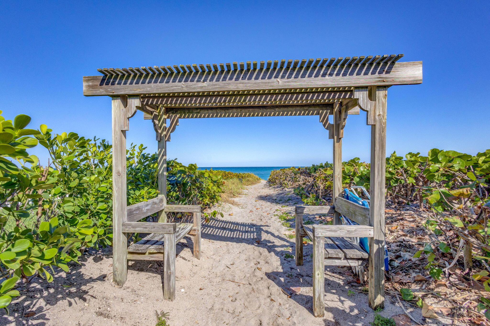 240 Celestial Way, Unit 5 Juno Beach, FL 33408 - Photo 3 of 41 a view of a table and chairs in patio