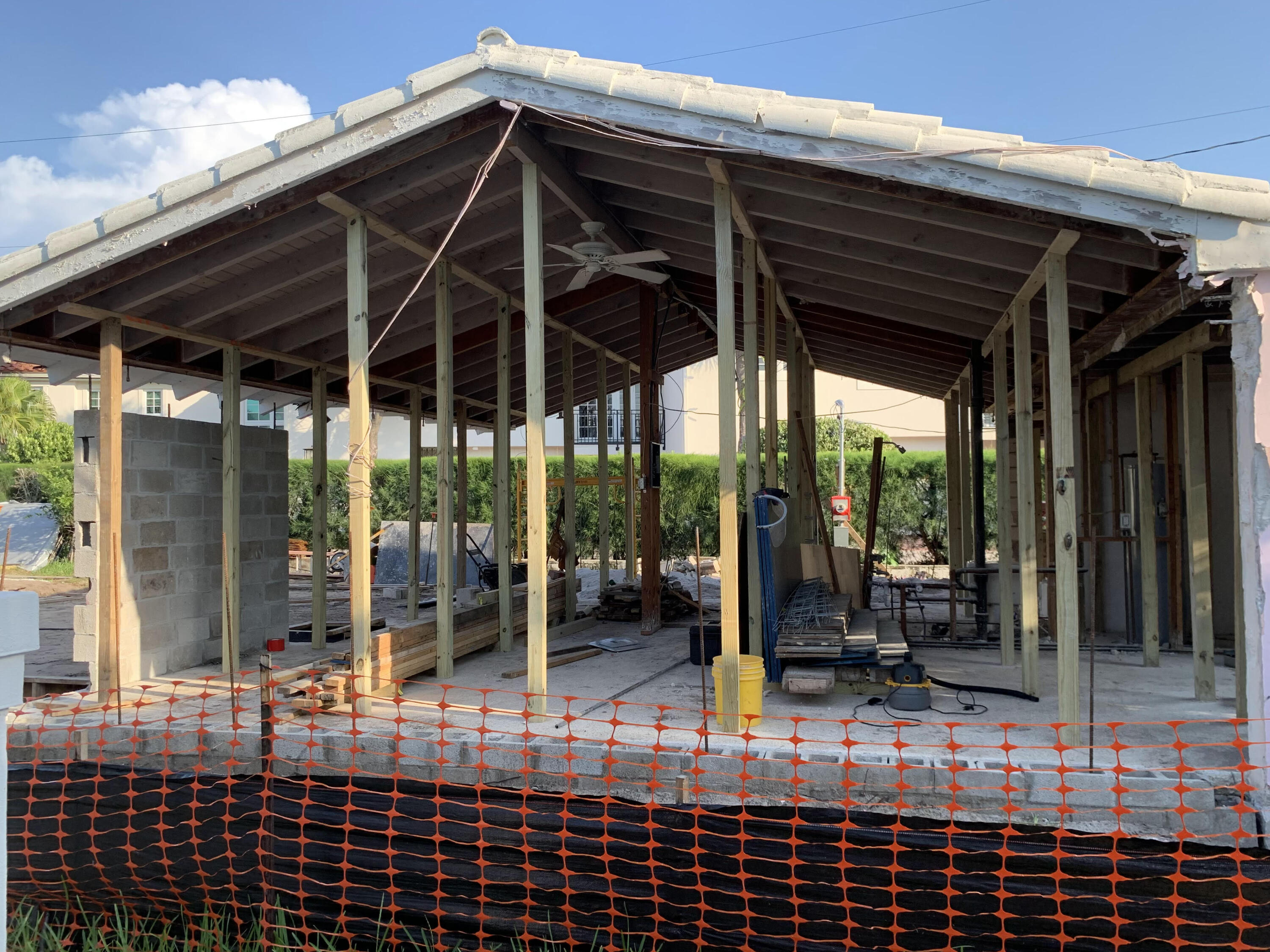 240 Celestial Way, Unit 5 Juno Beach, FL 33408 - Photo 36 of 41 a view of a porch with wooden floor