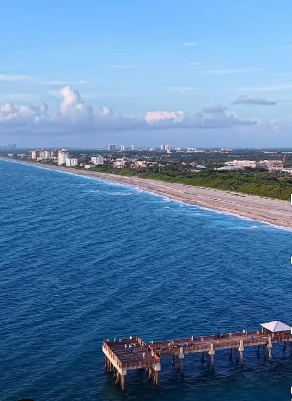 240 Celestial Way, Unit 5 Juno Beach, FL 33408 - Photo 40 of 41 a view of an ocean with city view