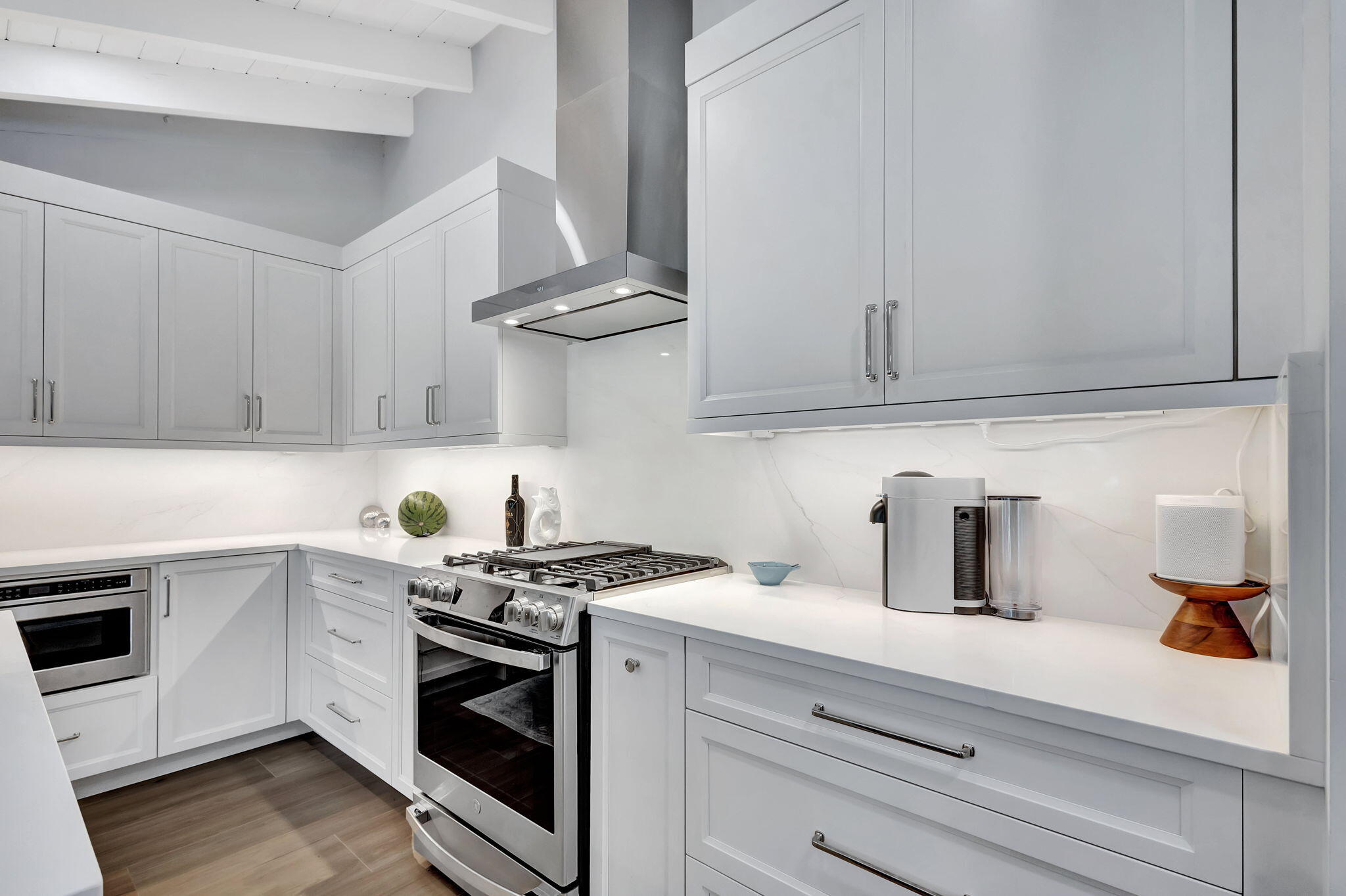 240 Celestial Way, Unit 5 Juno Beach, FL 33408 - Photo 10 of 41 a kitchen with appliances cabinets and a sink