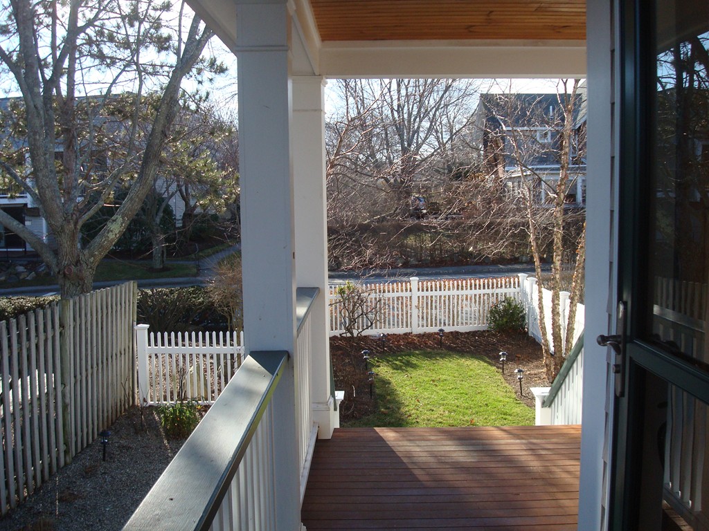14 Atlantic Road, Unit 5 Gloucester, MA 01930 - Photo 12 of 17 a view of a porch with a yard