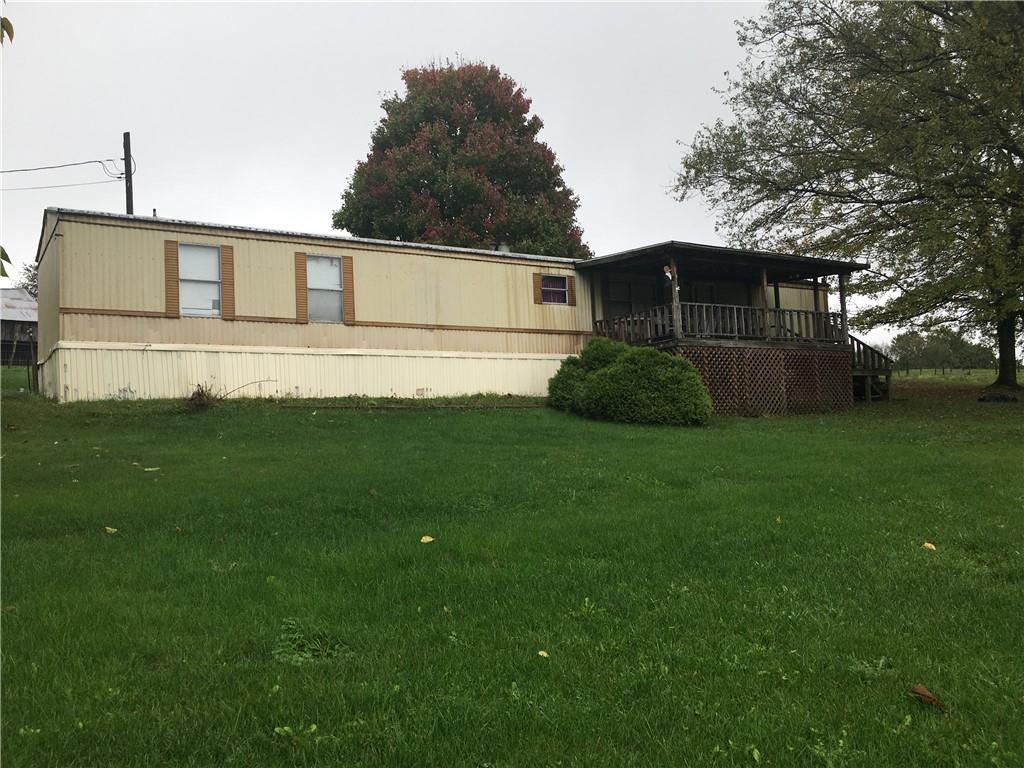 417 Red Mill Road Kittanning, PA 16201 - Photo 1 of 18 a front view of a house with a yard