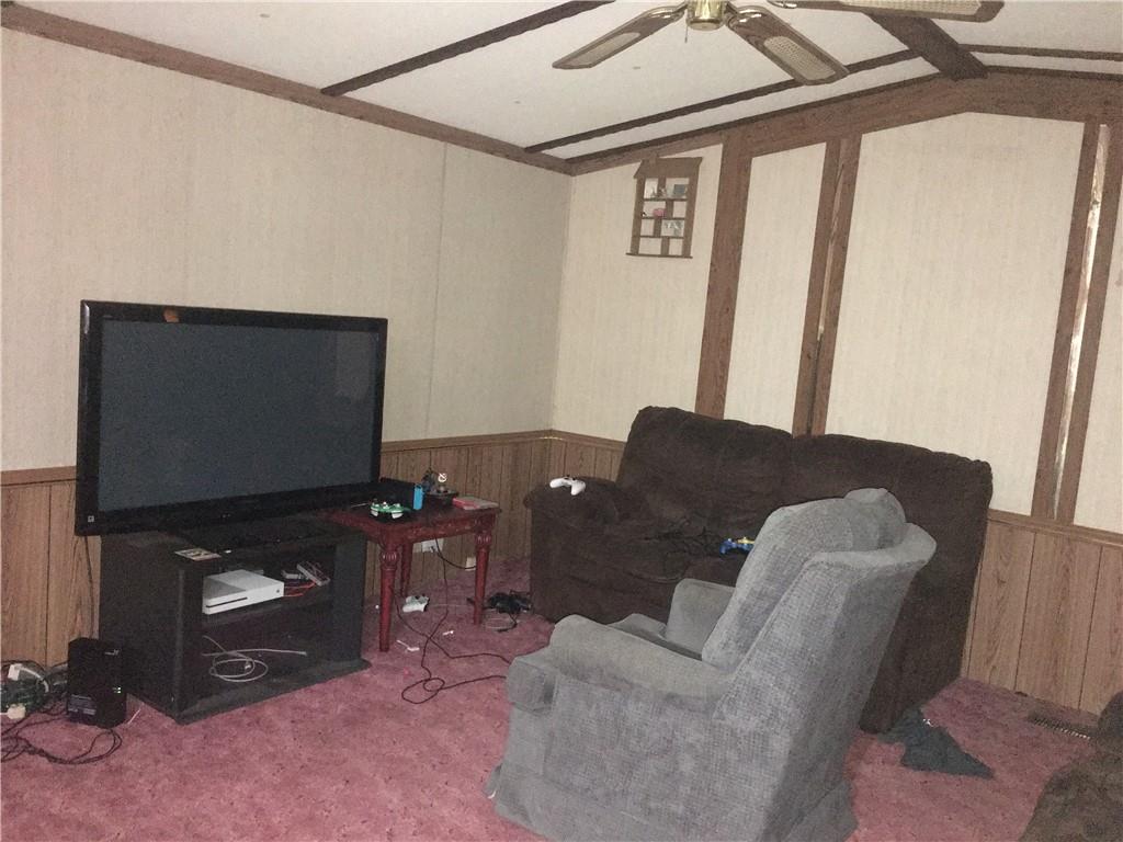 417 Red Mill Road Kittanning, PA 16201 - Photo 12 of 18 a living room with furniture and a flat screen tv