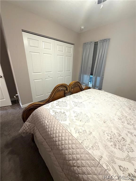 13591 Southwest 112th Street Dunnellon, FL 34432 - Photo 14 of 24 a bedroom with a bed and a window