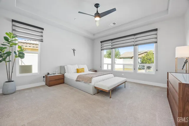a view of a hallway with wooden floor and closet