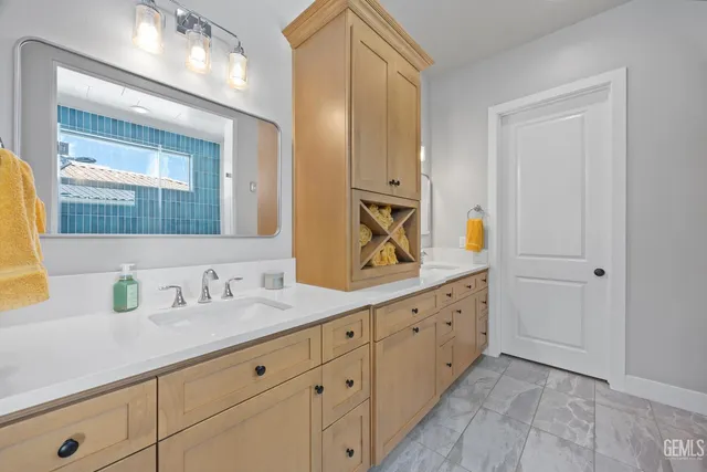 a bed room with a bed and a chair