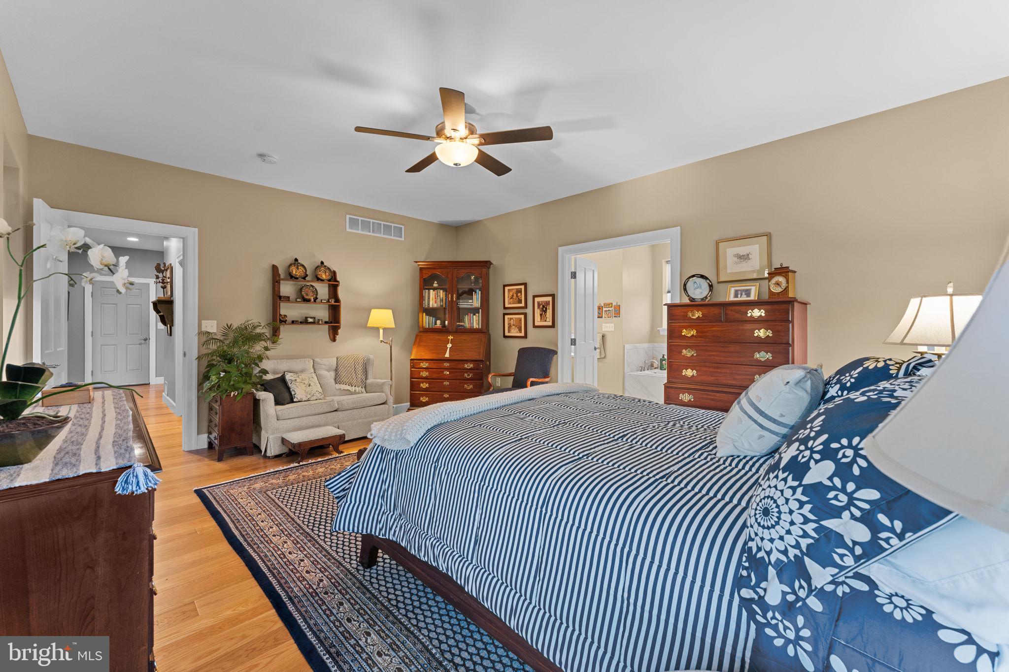 675 West Seven Stars Road Phoenixville, PA 19460 - Photo 19 of 45 a bed room with a bed and a dresser