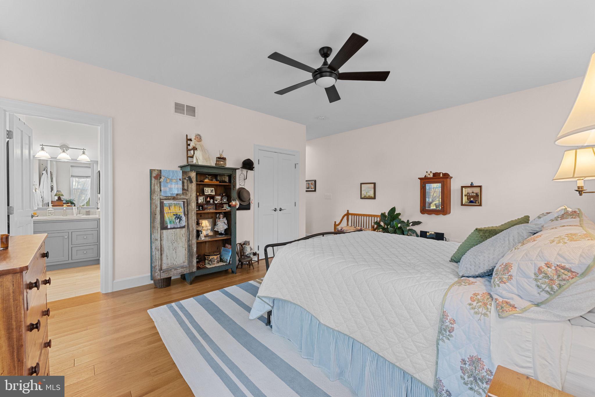 675 West Seven Stars Road Phoenixville, PA 19460 - Photo 26 of 45 a bedroom with a bed and a large mirror