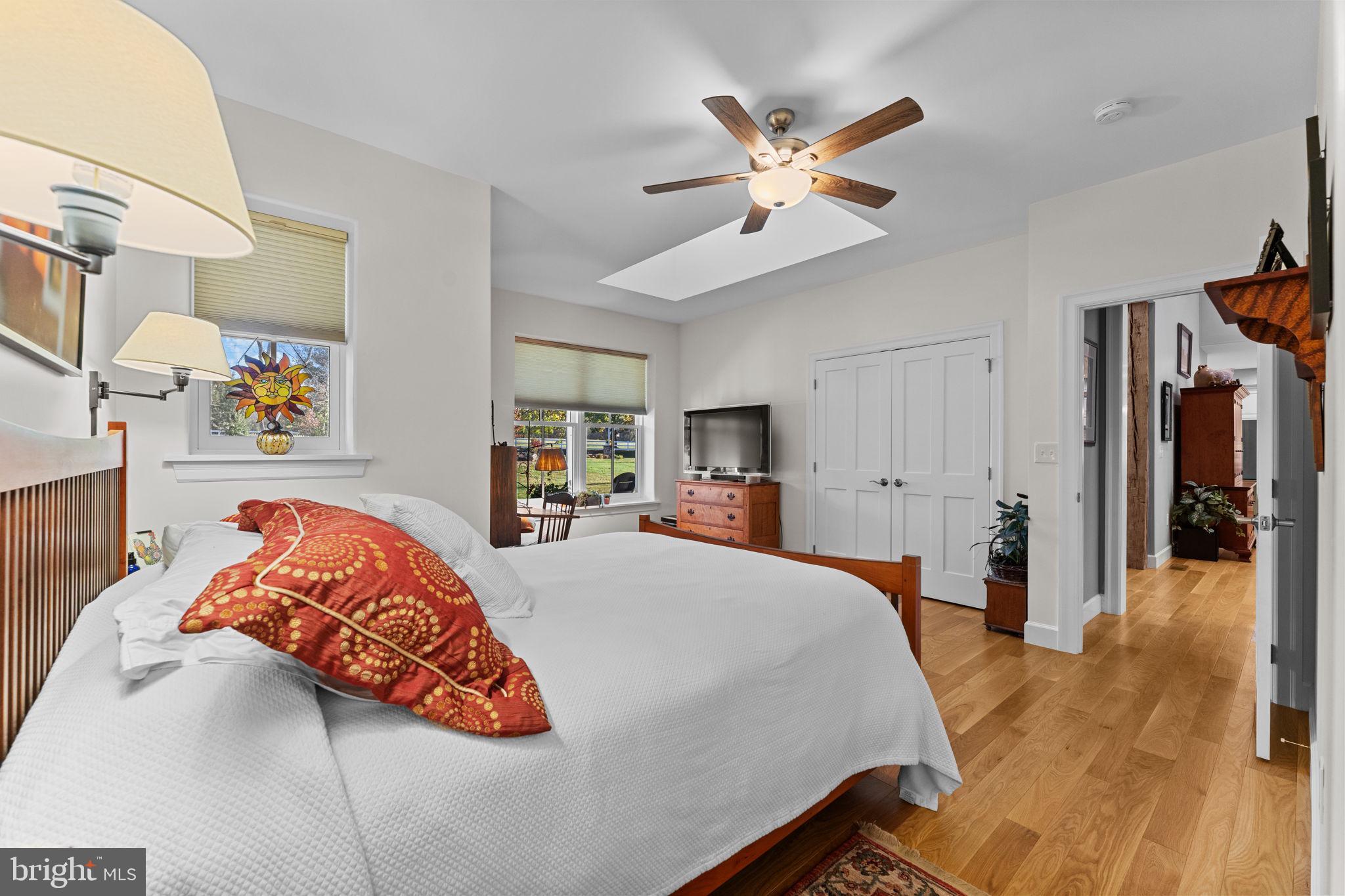675 West Seven Stars Road Phoenixville, PA 19460 - Photo 29 of 45 a bed room with a bed and a ceiling fan